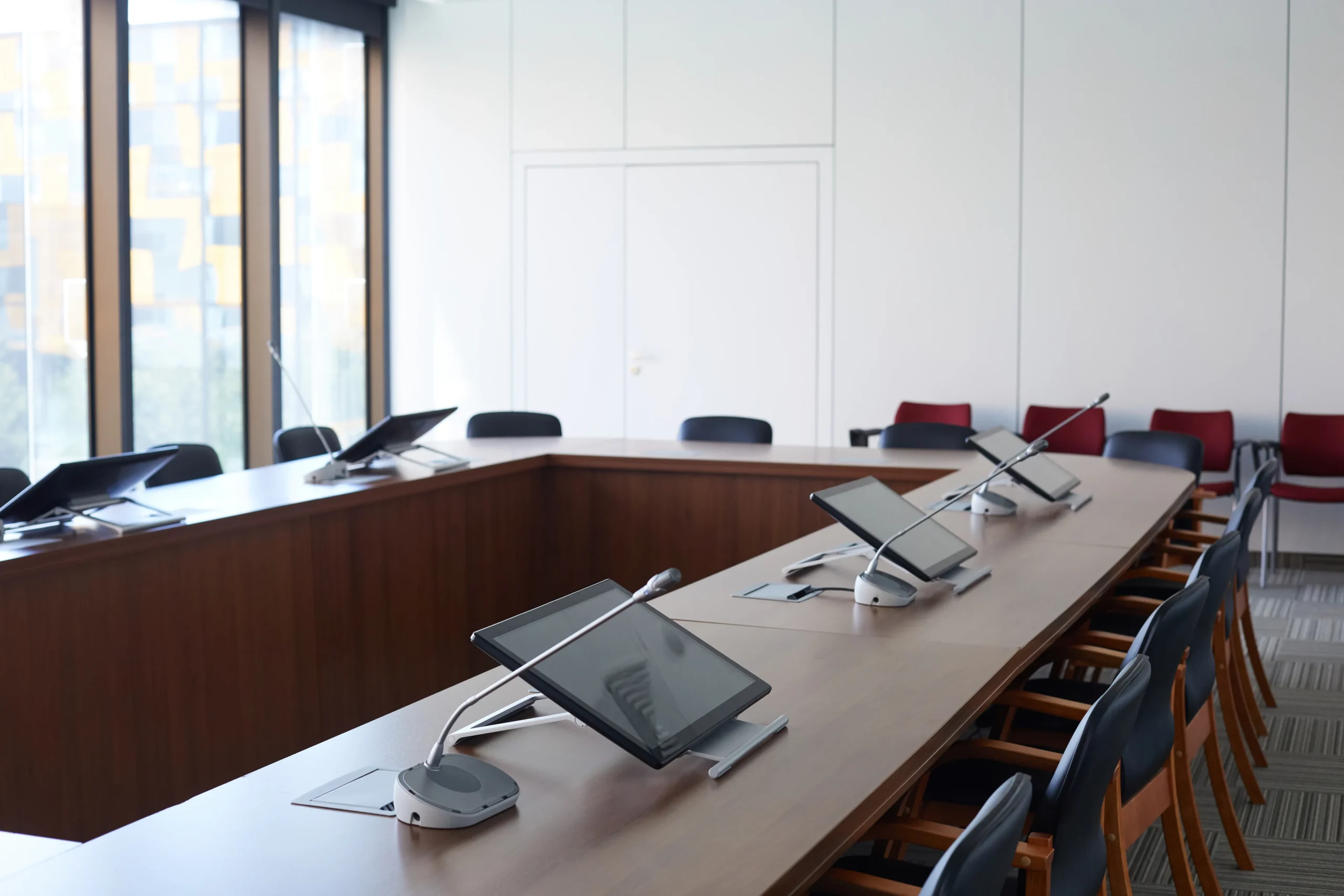 Modern corporate boardroom with integrated audiovisual technology