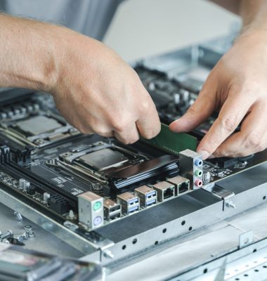 Man engineer,collector.Independent self computer assembly. Mounting in sockets processor,random access memory RAM,motherboard,fan. Assembly of home crypto farm.Generating tokens,cryptocurrency mining.